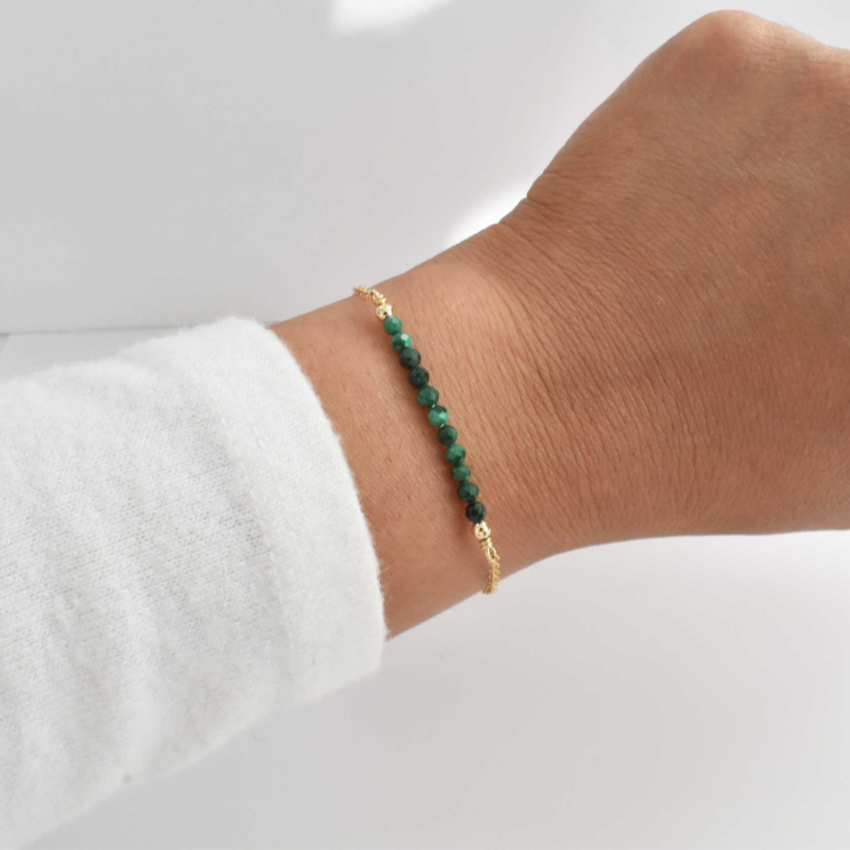 Dainty malachite gold filled bracelet with gold filled beads for a beautiful presentation. Bracelet features malachite healing gemstones and dainty gold filled chain.