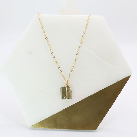 14k gold filled wire wrapped moldavite pendant with a delicate 14k gold filled chain.