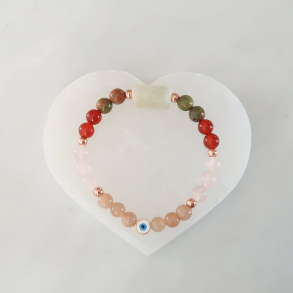 Heart shaped selenite recharging plate for gemstone jewelry and crystals.