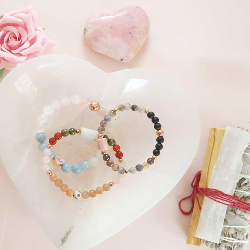 All collection of handcrafted healing crystal jewelry and crystals to help you bloom your intentions. Explore our options for intentional jewelry to help with fertility, abundance, grief or our metaphysical tools.  