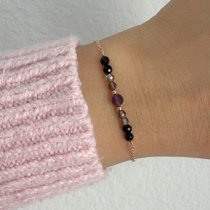 Empath protection bracelet from negative energy and feeling too much. Dainty healing bracelet features amethyst, black tourmaline, and smoky quartz. Handcrafted with love and infused with Reiki healing energy to bring an extra level of protection. 