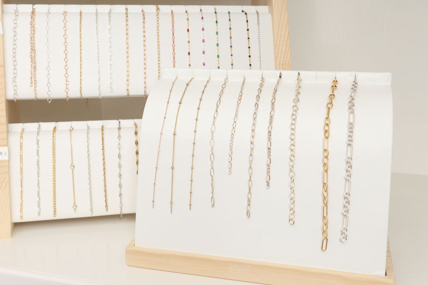 Permanent jewelry chain options in mixed metals and golds and silvers
