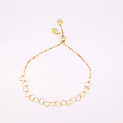 Gold big heart bracelet with adjustable ties