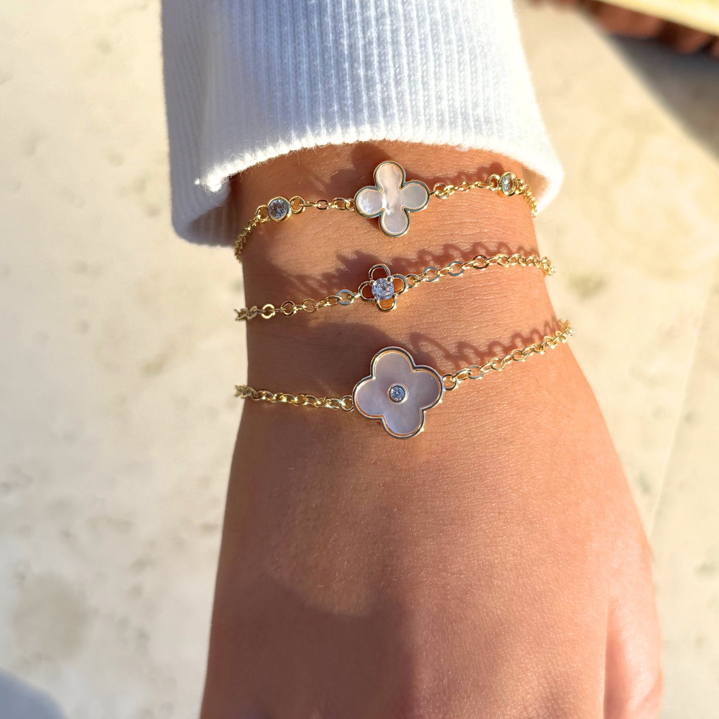 mother of pearl clover bracelets with gold bracelts
