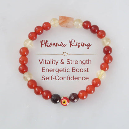 Phoenix Rising with evil eye protection for Solar, Sacral, & Root Chakra Healing. Featuring Carnelian, Citrine, Sunstone, and Garne. Infused with Reiki Healing - 3Rosebudsco.com
