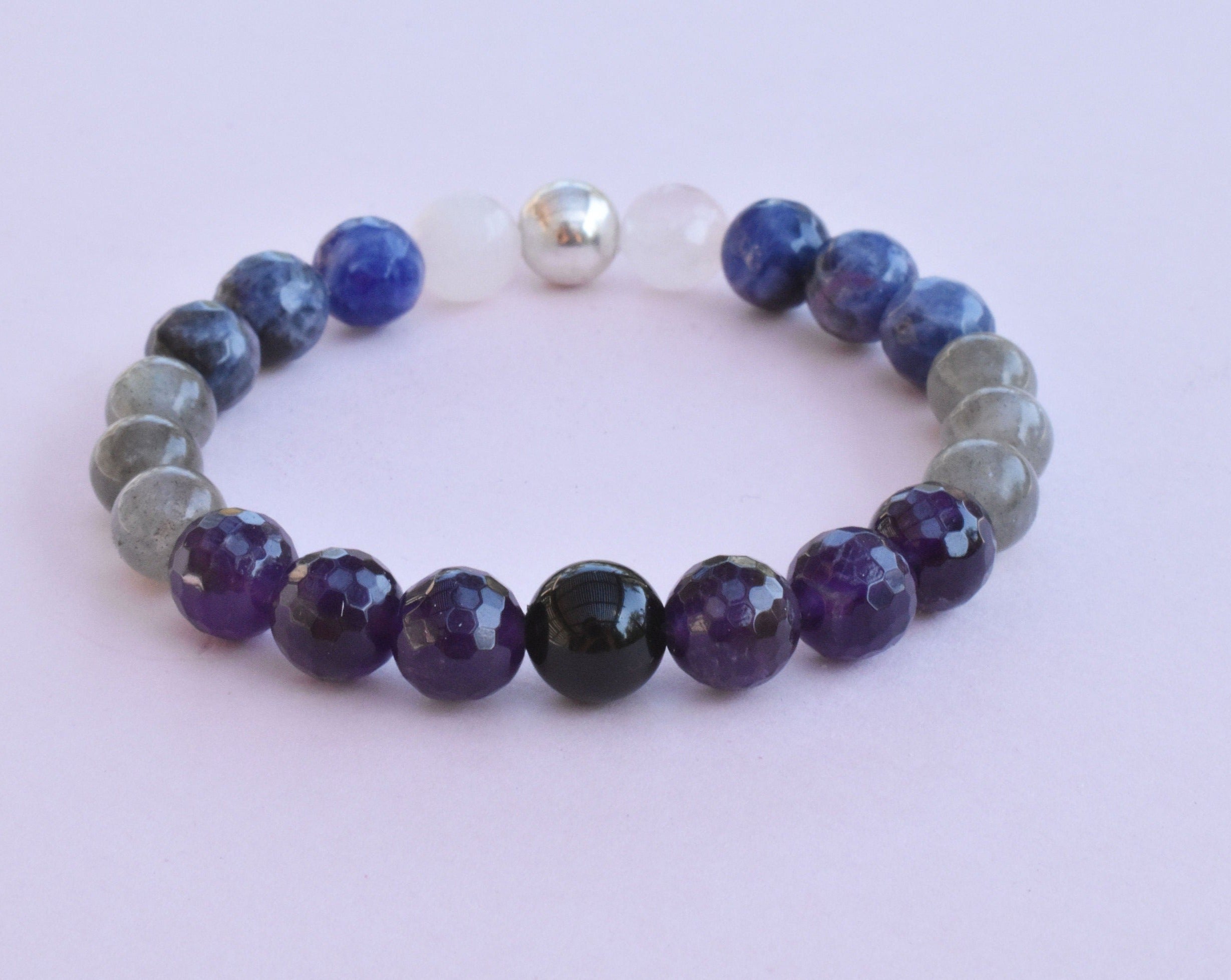Healing power bracelet to activate your inner psychic abilities. Healing gemstone bracelet features moonstone, labradorite, sodalite, amethyst, and black obsidian. 